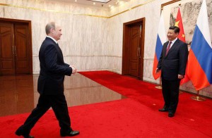 Il presidente russo Putin con il leader cinese Jinping - How Hwee Young Getty Images