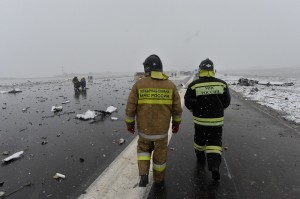 A Russian Emergency Ministry employee at the site of the crash - photo AP